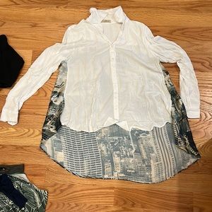 Large cape like button up.